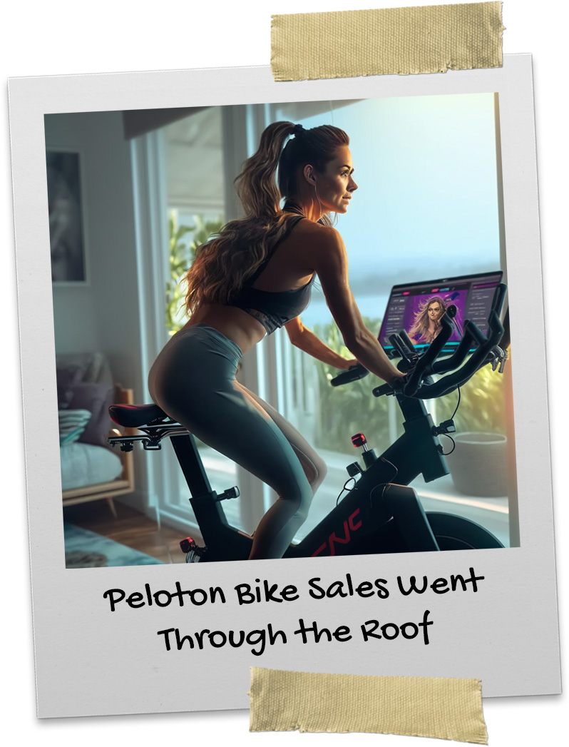 Female riding her Peloton bike overlooking the outdoors