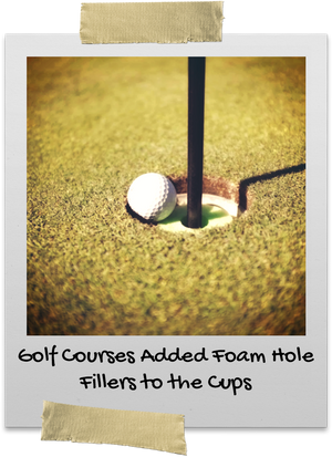 Golf ball sits on top of foam hole filler 