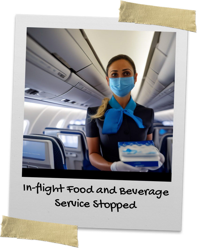 Flight attendant offering up face masks on a plane while wearing a face mask and gloves