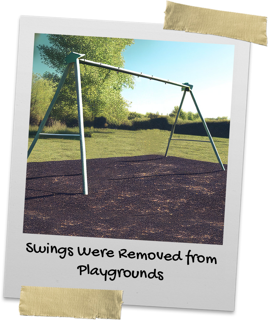 Swingset on a playground with the swings removed during COVID-19 pandemic