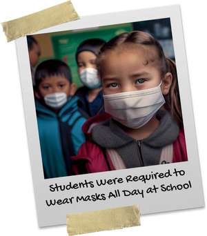 Three young students wearing face masks at school
